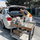 Staff collecting paint at our household hazardous waste collection center