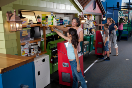 children at eco garage exhibit